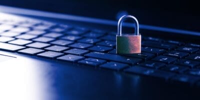 padlock on top of keyboard symbolizing cyber security